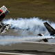 Illustration for article titled Racing A Lambo In A Biplane Is The Pitts